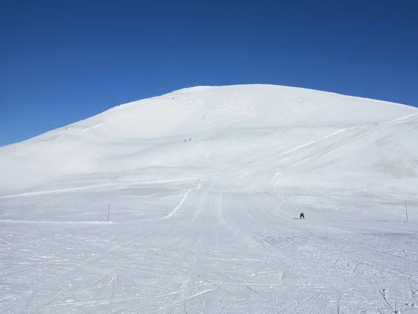 view of mountain slopes for skiing at winter season