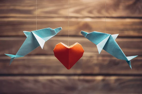 Two Origami Dolphin Red Paper Heart Wooden Background Greeting Card — Stock fotografie