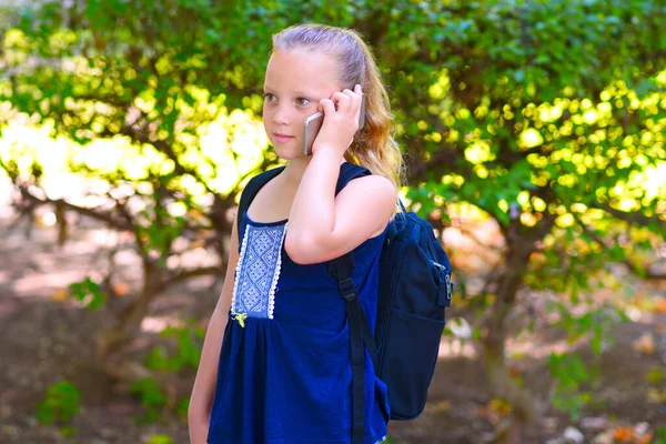 Happy Little Child Girl School Talking Mobile Phone City Park — Stockfoto