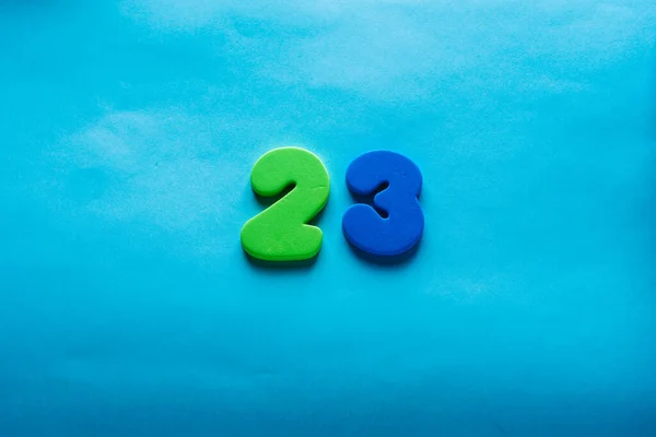 Number on a bright blue background. — Stock Photo, Image