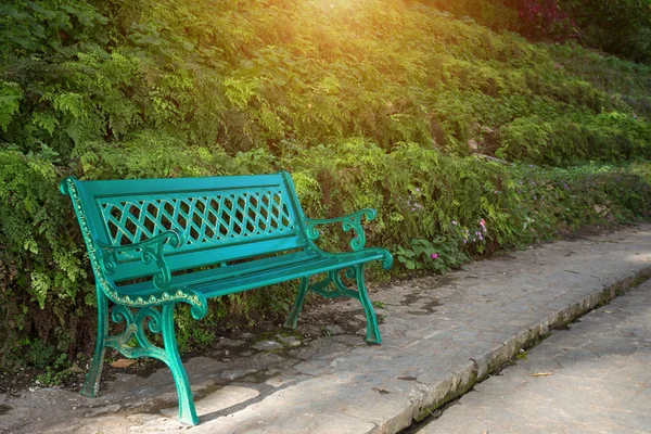 Green Metal bench in the park,stainless steel chair.