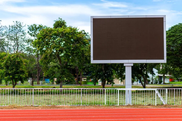 Digital blank scoreboard at football stadium with running track in sport stadium in outdoor ,Advertising Billboard LED, Empty digital.