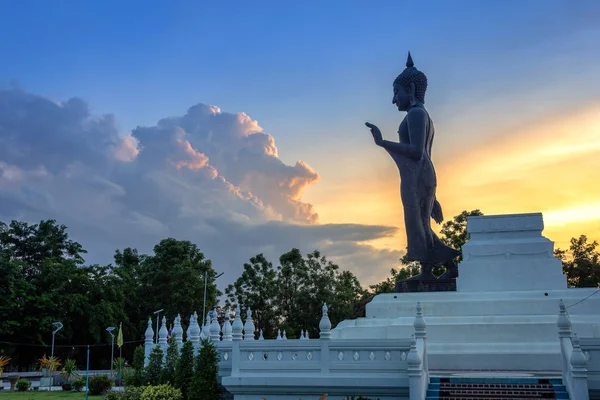Buddha statue (Buddha Naresuan Mangalapora) at sunset are Buddhist Temple Pagoda and major tourist attractions in Phitsanulok,Thailand.