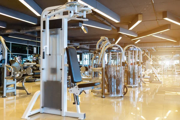 modern gym interior and fitness health club with sports exercise