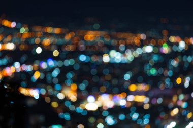 Renkli ışık Soyut dairesel bokeh gece geri şehir