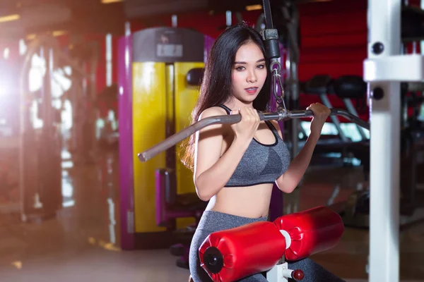 Fitness Asian women performing doing exercises training the shou — Stock Photo, Image