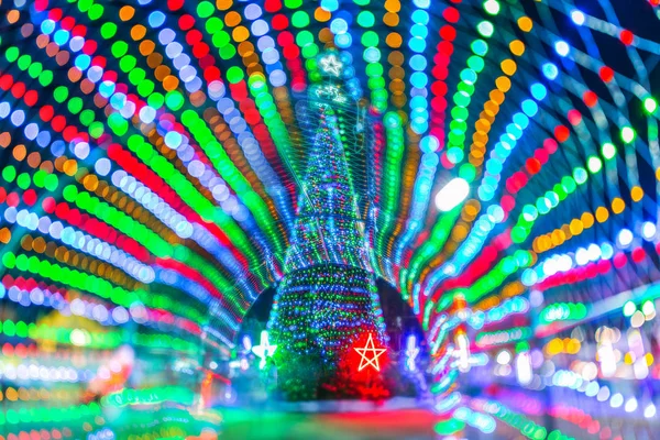 Luce colorata Bokeh astratto di albero di Natale e felice anno nuovo ye — Foto Stock