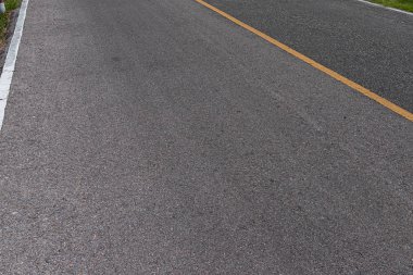 İşaretçizgileri beyaz çizgili doku Arka Plan ile asfalt yol