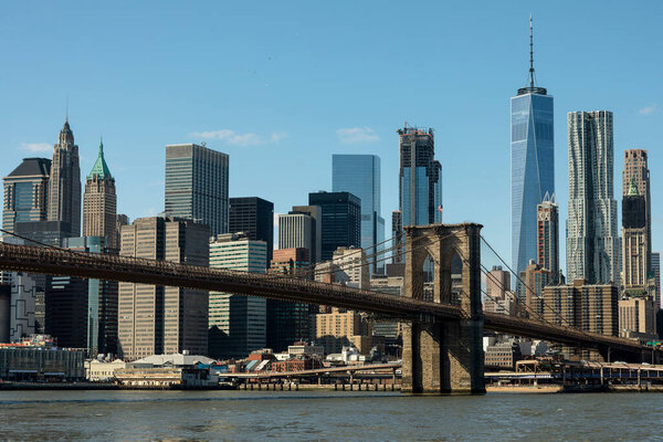 Brooklyn Bridge in New York City, over the East River, Manhattan and Brooklyn.