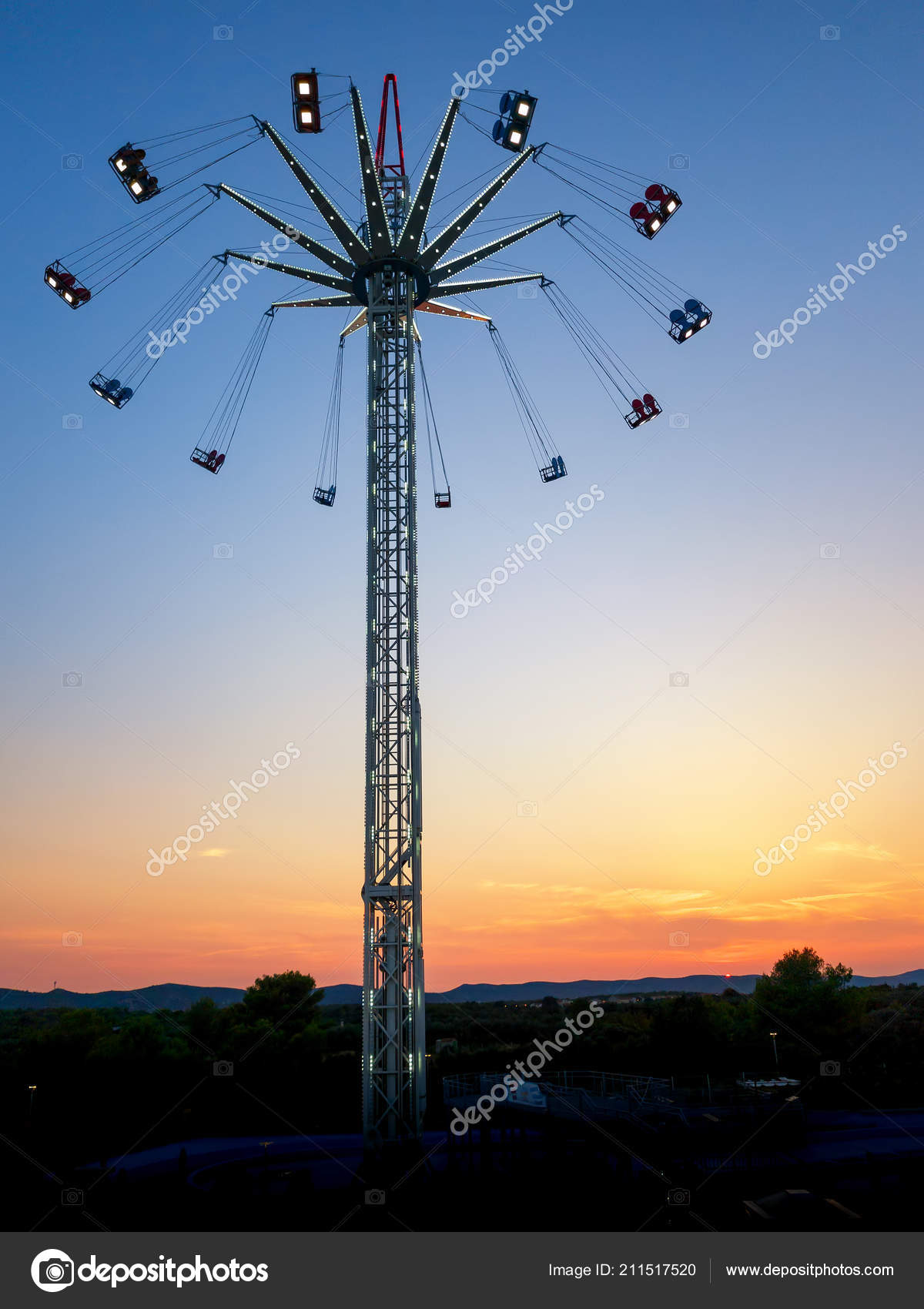 Swing Ride Star Flyer Amusement Ride In Sunset Stock