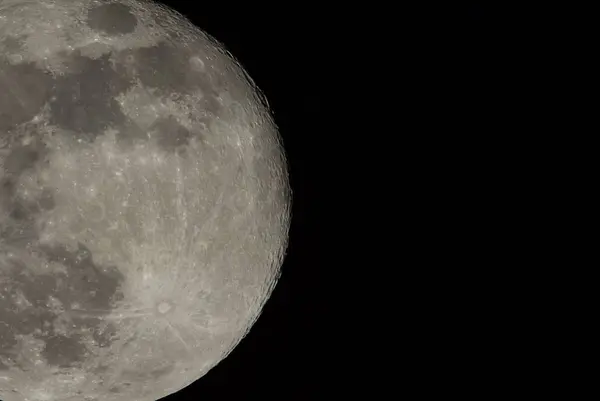 Closeup moon detail with crater and detail surface. Real photo. — Stock Photo, Image