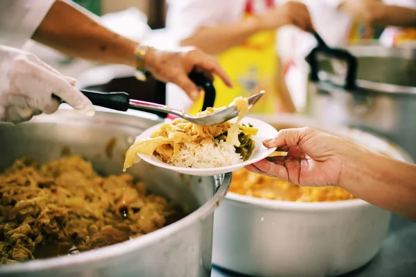 The Society of Sharing Food to Homeless and the Poorest: The Concept of Feeding