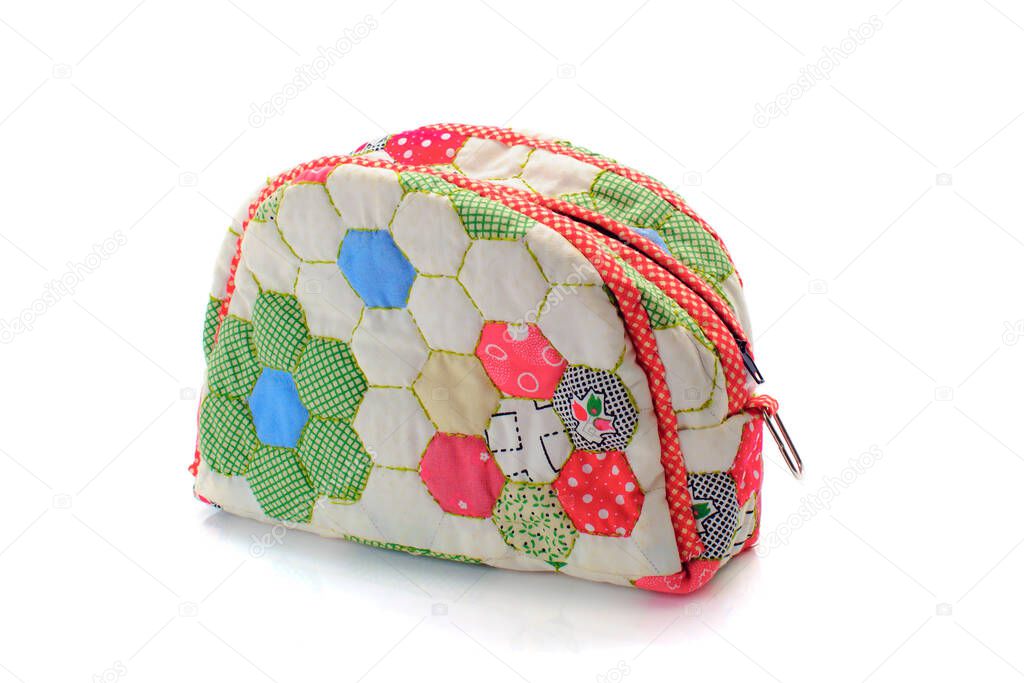 Coin bag made of rag isolated on white background