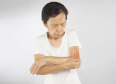 old asian woman feel elbow bones injury clipart