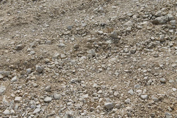 背景纹理的小岩石和颗粒的砂纹理 — 图库照片
