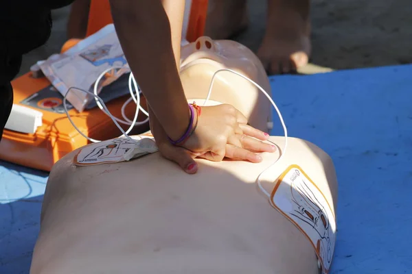 Resuscitation technique on dummy. First aid reanimation, CRP training, medicine, healthcare and medical concept