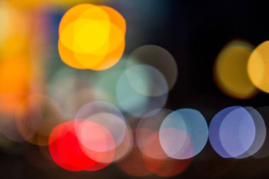 Siyah arka plan üzerinde renkli bokeh desen