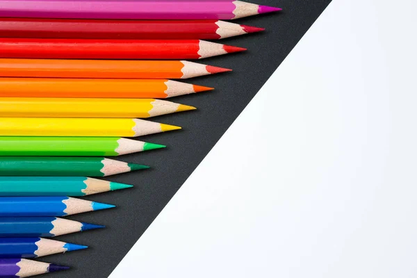 Pattern of Colorful Many colored pencils on black and white background and copy space