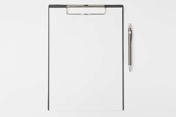 Top view of Document Board and pen on white background and copy space