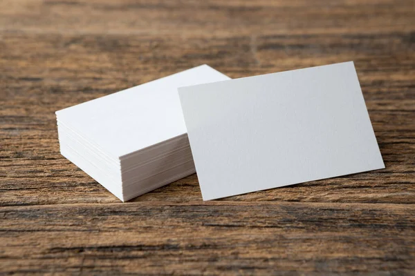 Stack of Business card on wood background and copy space