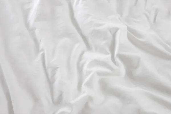 Cierre de ropa de cama Sábanas blancas con espacio para copias. —  Fotos de Stock