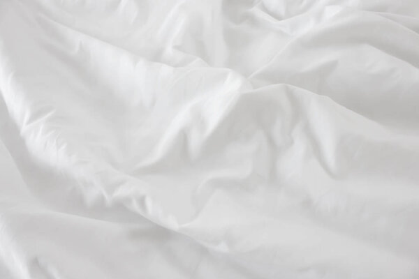Close up of bedding White sheets with copy space.