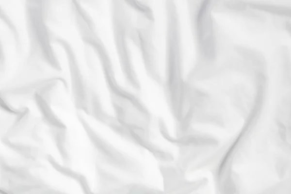 White bed linen background with copy spac