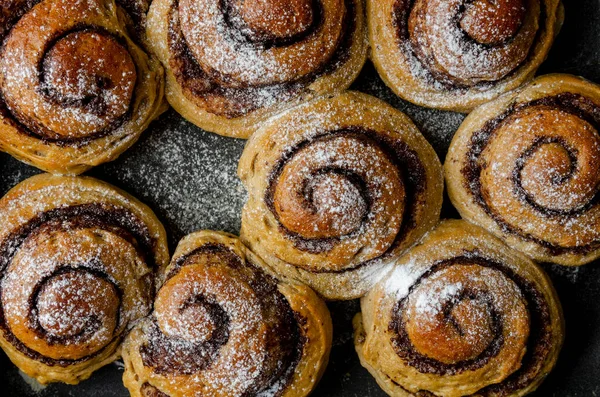 Buns made from banana dough with chocolate and cinnamon. Delicious breakfast — Stock Photo, Image