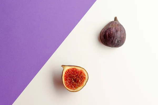 still life organic fig fruits, violet background.