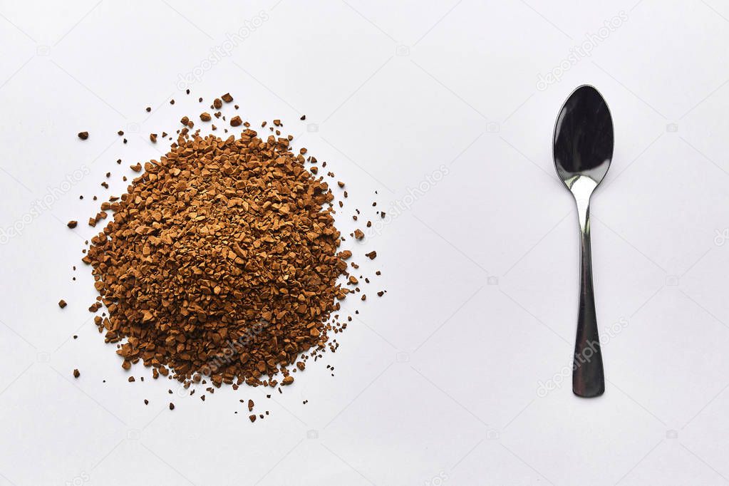 instant coffee on a white background, cutlery, spoon.