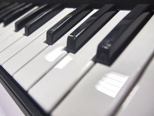 keys on piano keyboard. musical instrument with black and white keys.