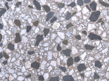  Beyaz ve siyah taşlı taş duvar dokusu.