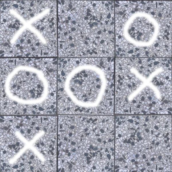 tik-tac-toe oyunu, beton ve taş bir doku üzerinde.