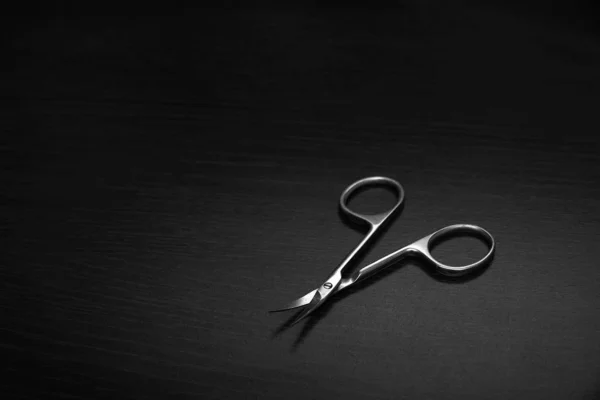 medical scissors on a dark background