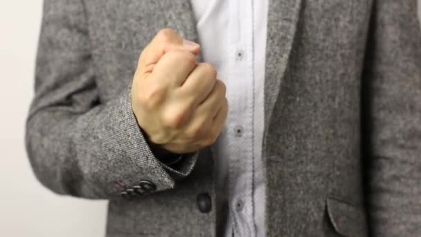 Solid Caucasian Man Gray Jacket Speckled Shirt White Background Pulling — Stock Video