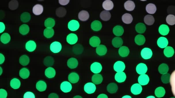 lumières de couleur déconcentrées à Noël ou nouvelle nuit de l'année, fond abstrait doux