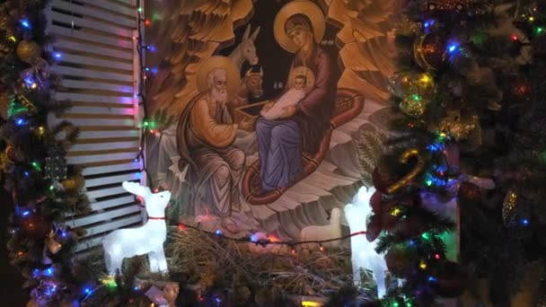 RUSSIA, VLADIMIR, 25 DEC 2019: Jesus birth orthodoicon near Christmas tree — 비디오