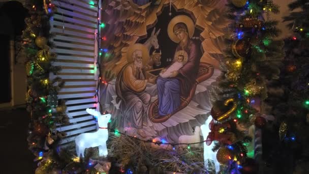 RUSSIA, VLADIMIR, 25 DEC 2019: Jesus birth orthodox icon near Christmas tree — Stock Video