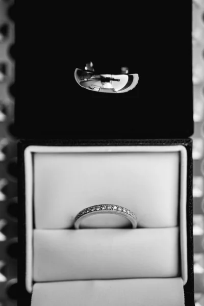 wedding rings in wooden box case