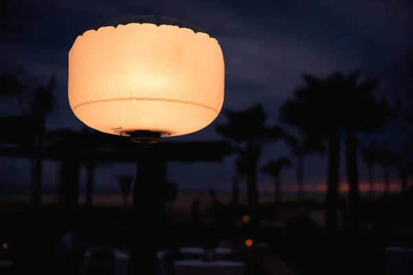 lamp outdoors, sunset background