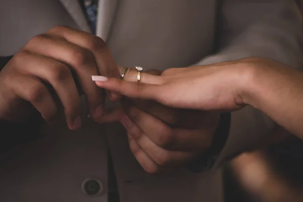 groom and bride getting married with rings on Wedding Ceremony
