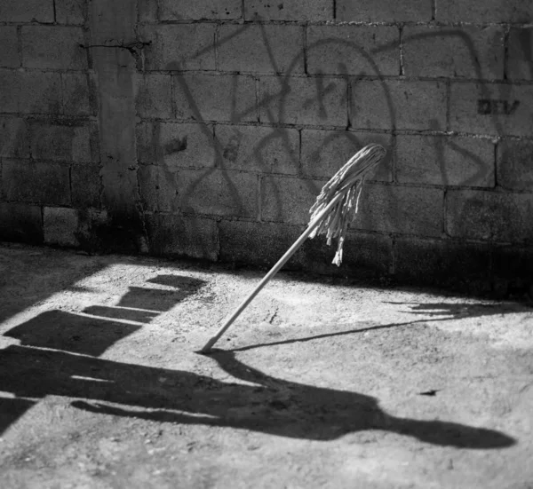 black white photo, asphalt ground with shadows