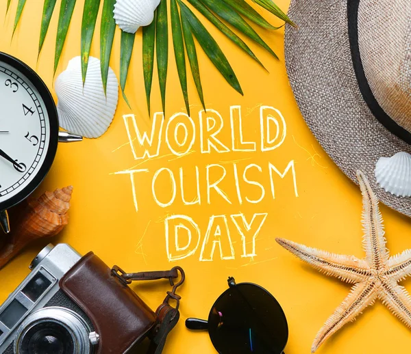 World Tourism Day Typography. Flat Lay Traveling Holiday Vacation Yellow Background