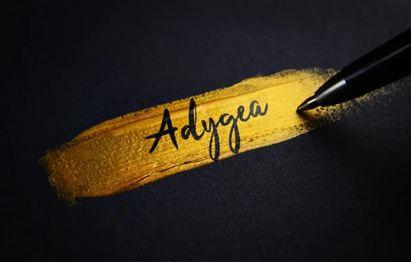 Adygea Handwriting Text Golden Paint Brush Stroke — Stock Photo, Image