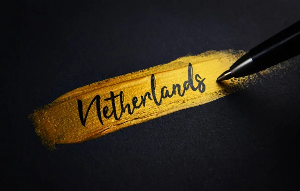 Netherlands Handwriting Text Golden Paint Brush Stroke — Stock Photo, Image