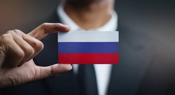 Businessman Holding Card Russia Flag — Stock Photo, Image