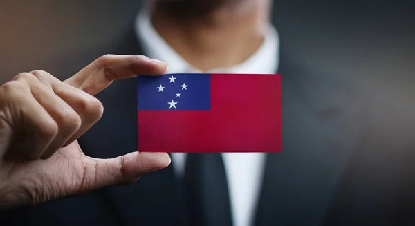 Businessman Holding Card of Samoa Flag