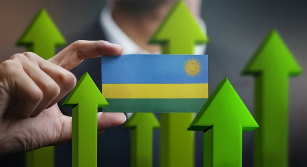 Nationales Wachstumskonzept Grüne Pfeile Nach Oben Geschäftsmann Mit Karte Ruanda — Stockfoto