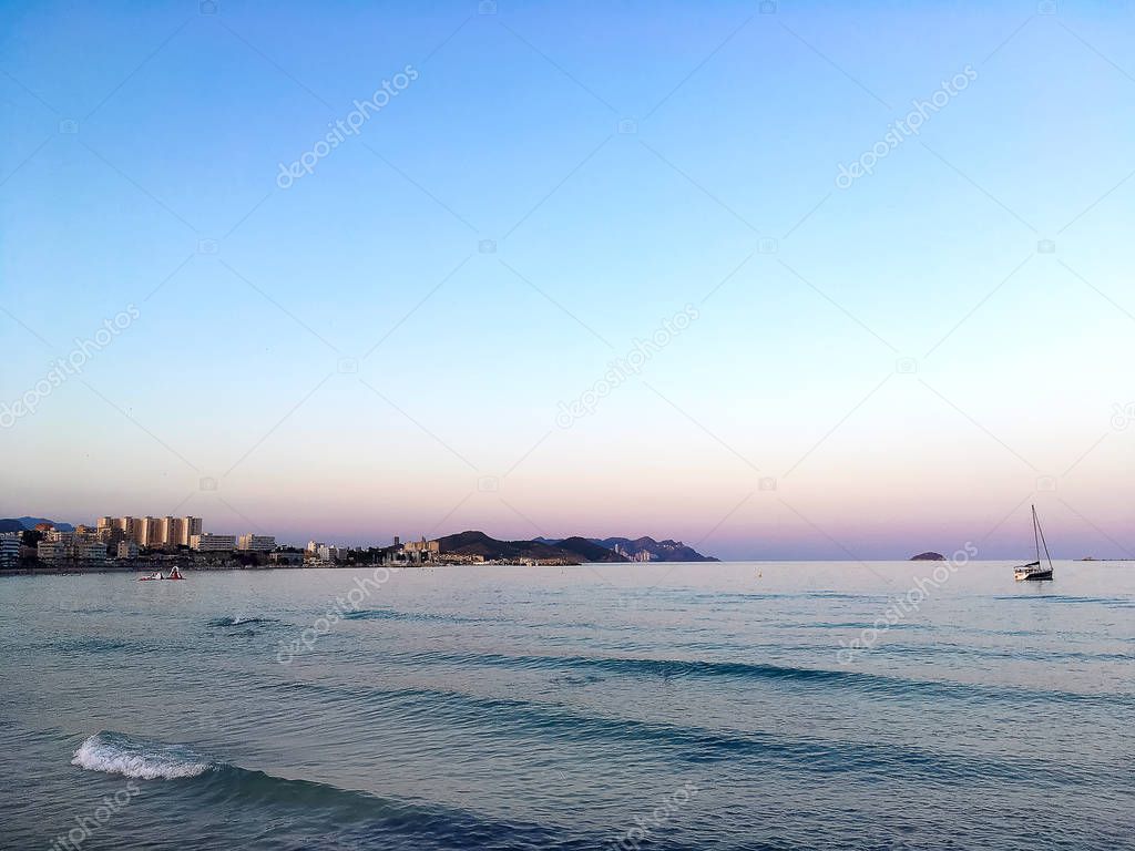 Beach of Villajoyosa, which is located about 20 km south of Benidorm. With its fishermen's houses, the river Amadoria,sandy beaches and the promenade to the harbour in the sunrise