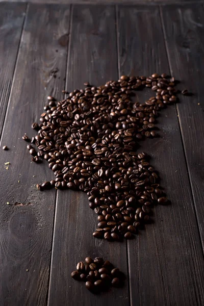 Palonych ziaren kawy, mogą być używane na ciemnym tle drewnianych — Zdjęcie stockowe